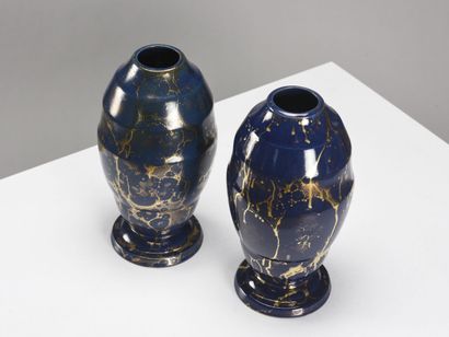 null Lucien BRISDOUX (1878-1973)

Pair of midnight blue enamelled ceramic vases decorated...