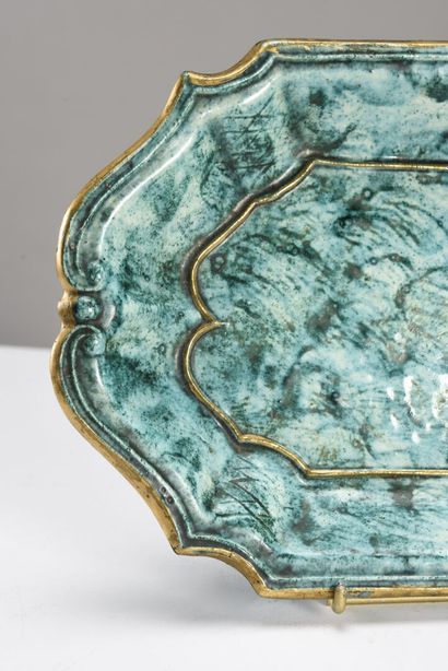 null Jean MAYODON (1893-1967)

Neoclassical dish with a green background and gilded...