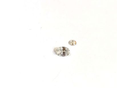 null Cushion cut diamond (chipped) of 0.28 carat (beautiful color) and a diamond...