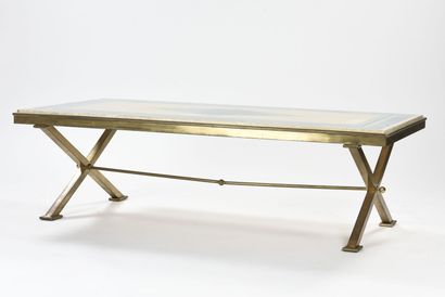 null JEAN CHARLES PARIS

Table basse à piétement en X en métal doré d'où repose dans...