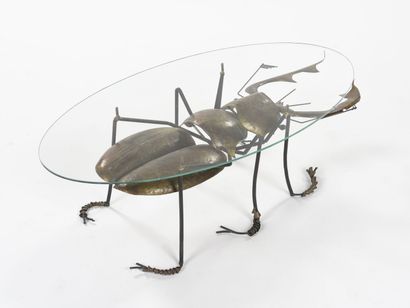 null François MELIN (XXe siècle)

Table basse à piétement en forme de scarabée réalisé...