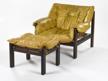 null Jean GILLON (1919-2007)

Fauteuil et son ottoman à structure en Jacaranda à...