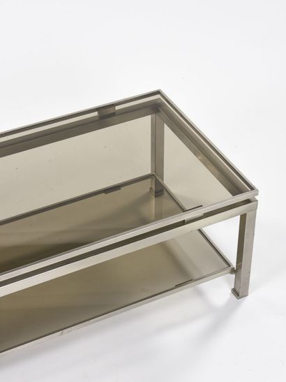 null Guy LEFEVRE (1933-2018)

Table basse en métal brossé à double niveaux à plateaux...