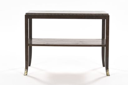 null Christian KRASS (1868-1957)

Table à deux plateaux rectangulaires à décor marqueté...