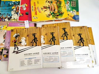 null Lucky LUKE. 21 albums (état moyen ou dos abimés)