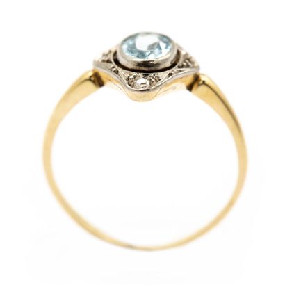 null Antique two gold (585) 14K corbeille oblong ring set with an oval aquamarine...