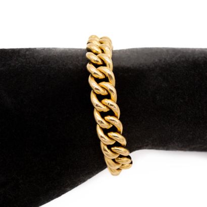 null Flexible bracelet in 18 K (750) yellow gold. 

Weight 23,5 g. 

Length: 19 cm...