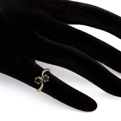 null You and me" ring in 18 K (750) yellow gold with two sapphires, the ring set...