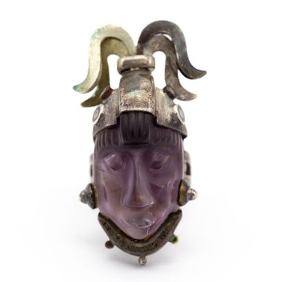 null Important silver ring, head of Inca molded in purple glass, cased in silver....