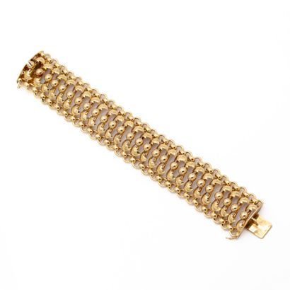 null Large bracelet en or jaune 18 K(750) ligne de perles d'or, lignes de feuilles...