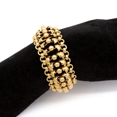 null Large bracelet en or jaune 18 K(750) ligne de perles d'or, lignes de feuilles...