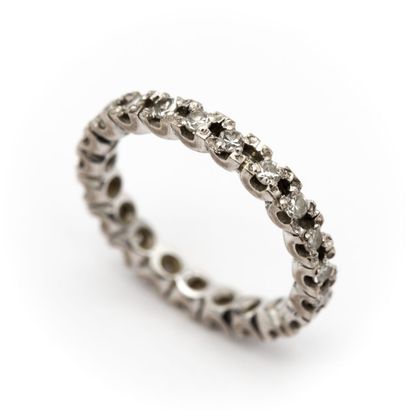 null American wedding band in 18 K (750) white gold, entirely set with diamonds....