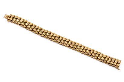 null Flexible bracelet in 18 K (750) yellow gold, American mesh. 

Weight : 29,5...