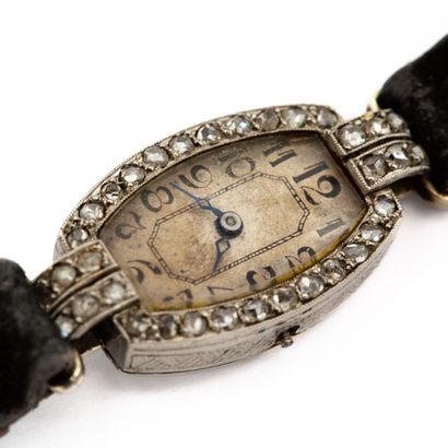 Lady's watch, barrel case in platinum, surrounded...