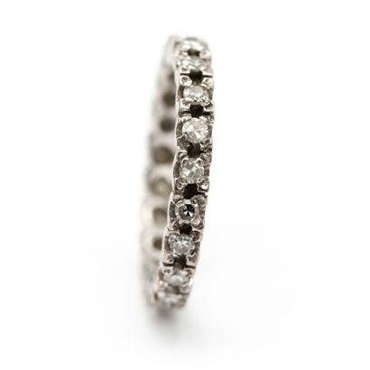 null American wedding band in 18 K (750) white gold, entirely set with diamonds....