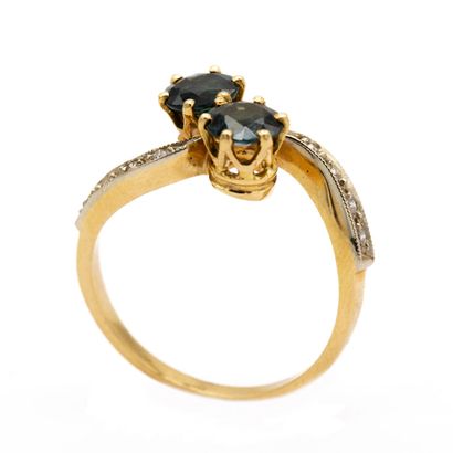null You and me" ring in 18 K (750) yellow gold with two sapphires, the ring set...