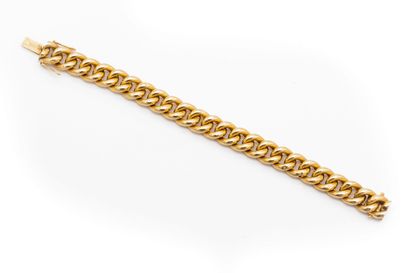 null Flexible bracelet in 18 K (750) yellow gold. 

Weight 23,5 g. 

Length: 19 cm...