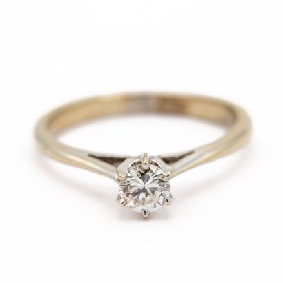 null 18K (750) white gold ring set with a solitaire modern cut diamond weighing approximately...