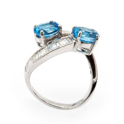 null You and me ring in 18K white gold (750) set with two blue topazes, the ring...