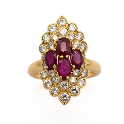 null Ring in 18 K (750) yellow gold stylizing a marquise with four rubies in clover,...