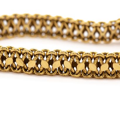 null Bracelet in 18 K (750) yellow gold American mesh. 

Weight 14,2 

Length 18,5...