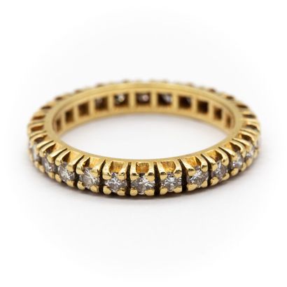 null American wedding band in 18K yellow gold, fully set with diamonds. 

Weight...