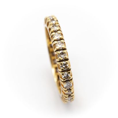 null American wedding band in 18K yellow gold, fully set with diamonds. 

Weight...