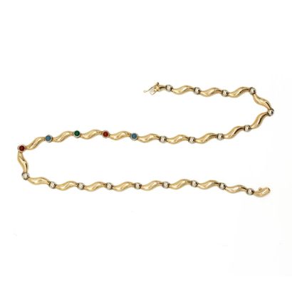 null Necklace in 14K yellow gold (585) with a series of rigid, wavy and articulated...