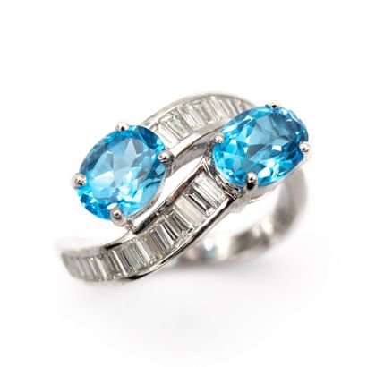 null You and me ring in 18K white gold (750) set with two blue topazes, the ring...