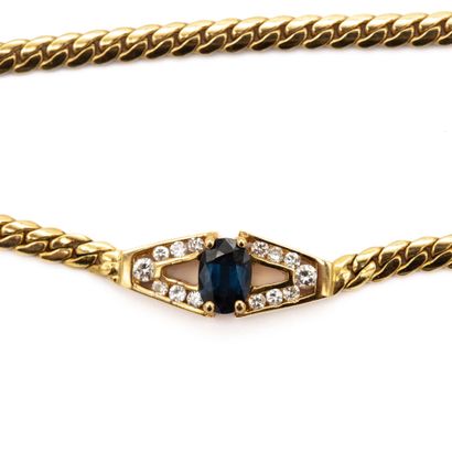 null Necklace in 18K (750) yellow gold cut with a diamond centered on a sapphire...