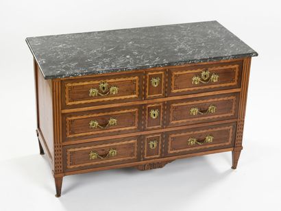 null Rectangular chest of drawers in mahogany and light wood veneer it opens with...