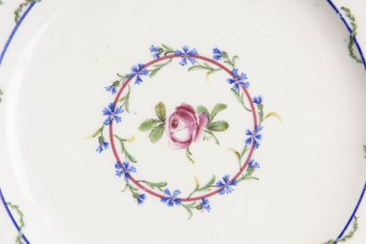 null SEVRES soft porcelain plate decorated with a rose surrounded by two garlands...