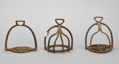null Suite of three stirrups including two wrought iron cages 
18th century
