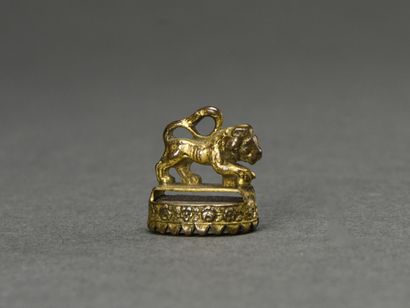 null Cachet in gilded bronze surmounted by the lion of St Mark. The matrix is in...