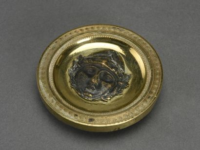 null Pair of bronze and gilt brass medallions decorated with a helmeted Minerva 
Around...
