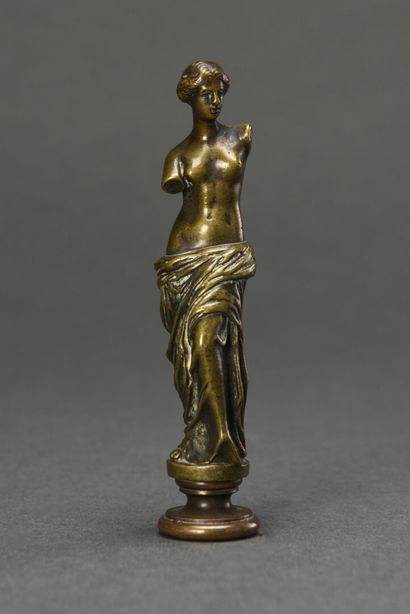 null Bronze stamp Venus de Milo, monogrammed EC 
19th century.
H :10 cm