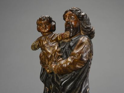 null Sujet en bois sculpté polychrome, Saint Joseph et l'Enfant Jésus 
18ème siècle.
H:43...