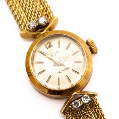 null MOD Signed, ladies' watch, case and bracelet in 18K (750) yellow gold, attachments...
