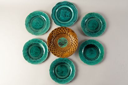 null Manufacture of RUBELLES, six dessert plates and a pie dish in enamelled earthenware...