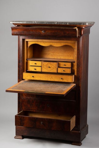 null Secretary in flamed mahogany, grey veined marble top, it opens with four drawers...