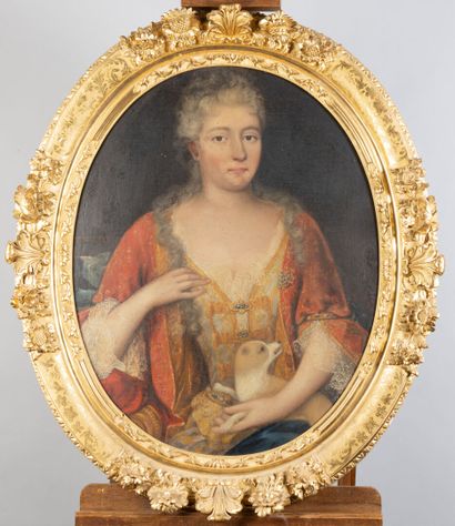 null Ecole française vers 1720
Portait de femme à la robe rouge et au carlin 
Huile...
