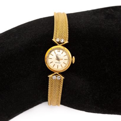 null MOD Signed, ladies' watch, case and bracelet in 18K (750) yellow gold, attachments...