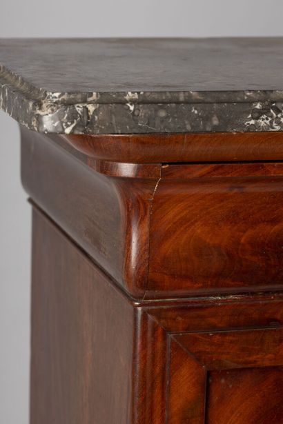 null Secretary in flamed mahogany, grey veined marble top, it opens with four drawers...