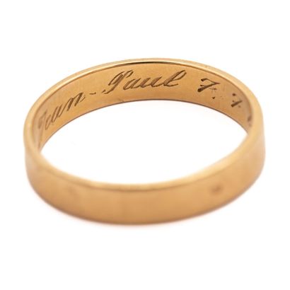Wedding ring in 18 K (750) yellow gold. 
AIGLE...