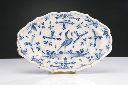 null LYON Pair of oval earthenware dishes decorated with birds in a landscape 
22...