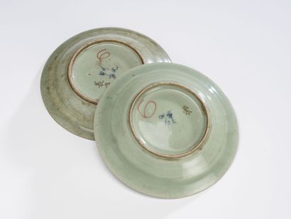 null China XXth Two celadon porcelain plates with blue enamel decoration.
Diameter...