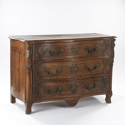 Walnut chest of drawers molded and carved...