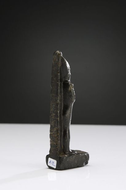 null Statuette of mummiform Osiris standing, wearing the scepter and flagellum, and...