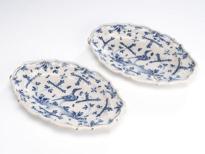 null LYON Pair of oval earthenware dishes decorated with birds in a landscape 
22...