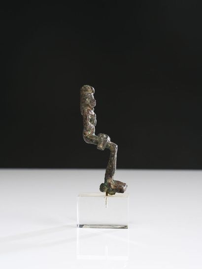 null Statuette of Isis lactans, representing the goddess Isis seated, holding her...